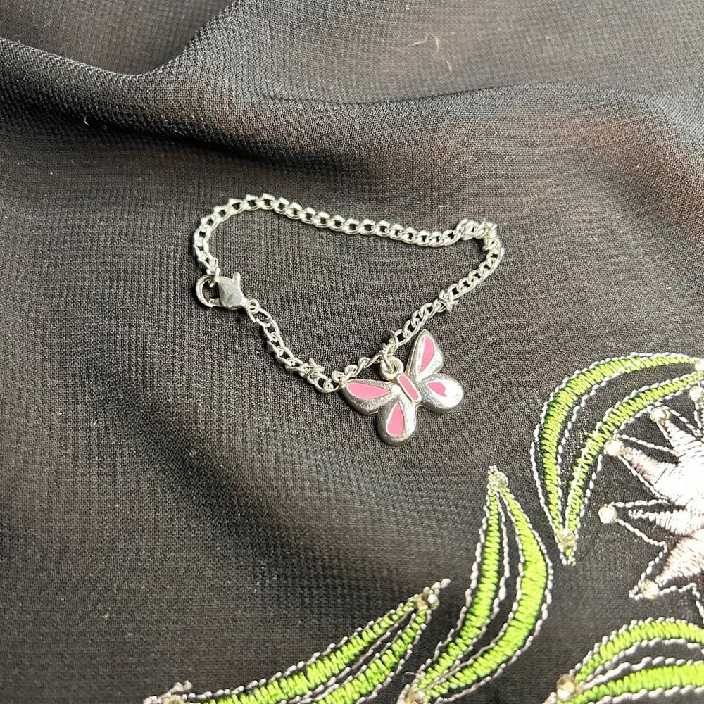 Cute unbranded Kids Silver Tone Metal Butterfly charm Bracelet.